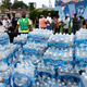 A pallet of bottled water is delivered to a recreation center on August 13, 2019 in Newark, New Jersey. Residents of Newark, the largest city in New Jersey, received free water after lead was found in the tap water.